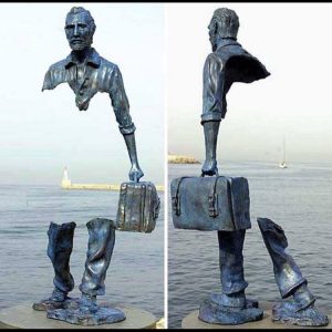 Refugee statue on water